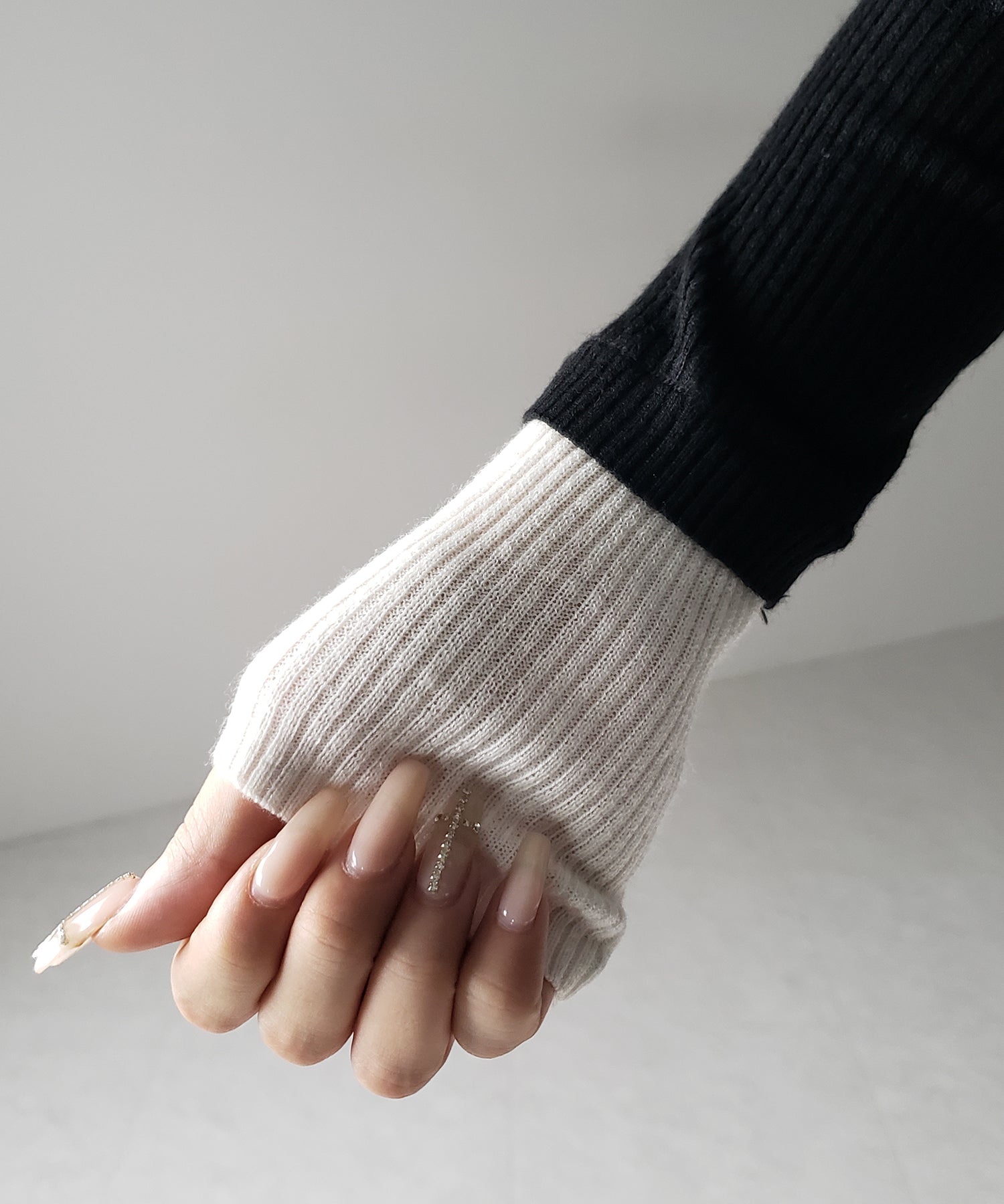 フェイクレイヤードスリムリブニットトップス / Fake layered slim rib knit tops