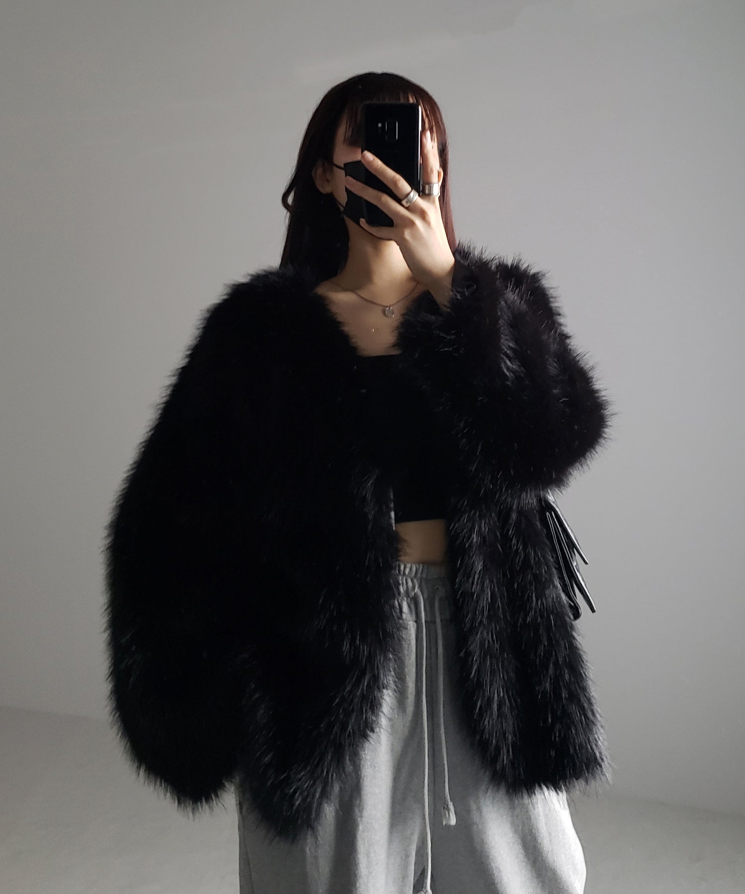 ノーカラーボリュームフェイクファーコート
