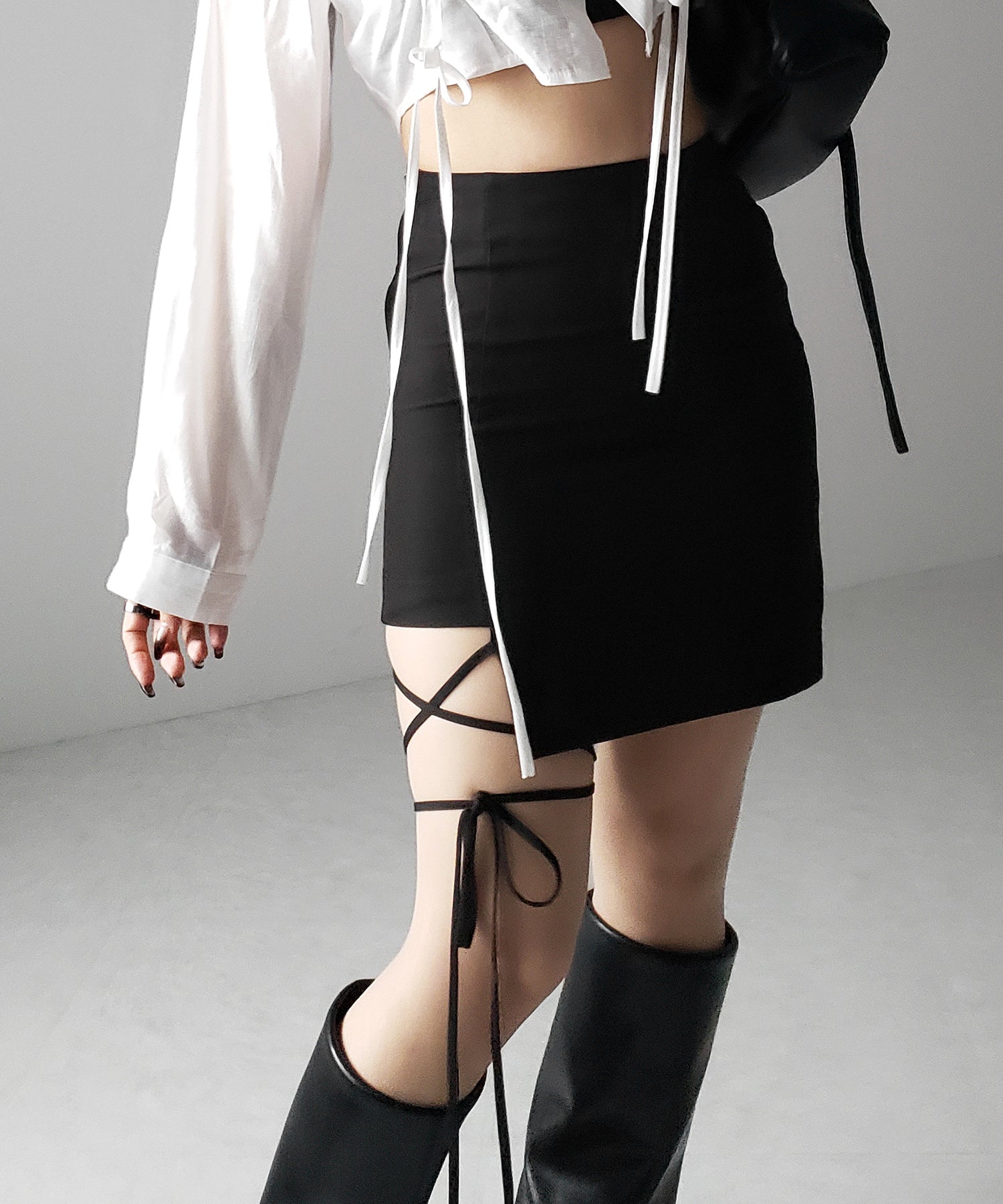 【 2color 】クロスストラップサイドリボンミニスカート / cross strap side ribbon mini skirt