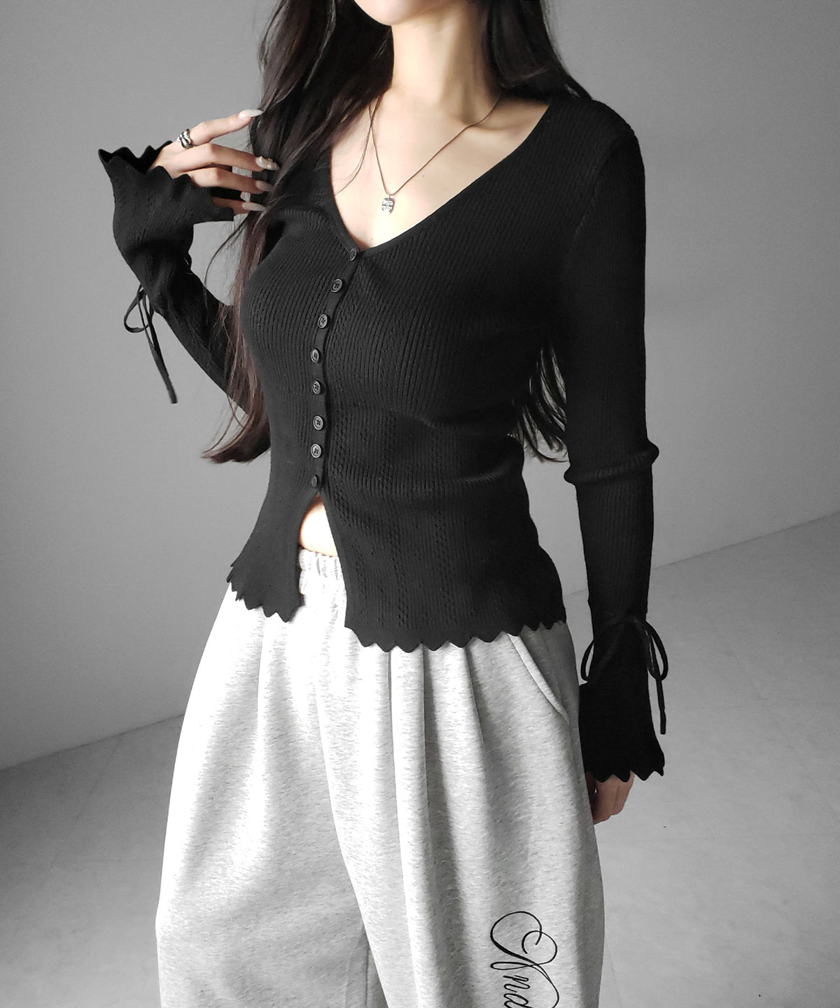 フレアリボンスリーブ透かし編みニットカーディガン / flare ribbon sleeve openwork knit cardigan