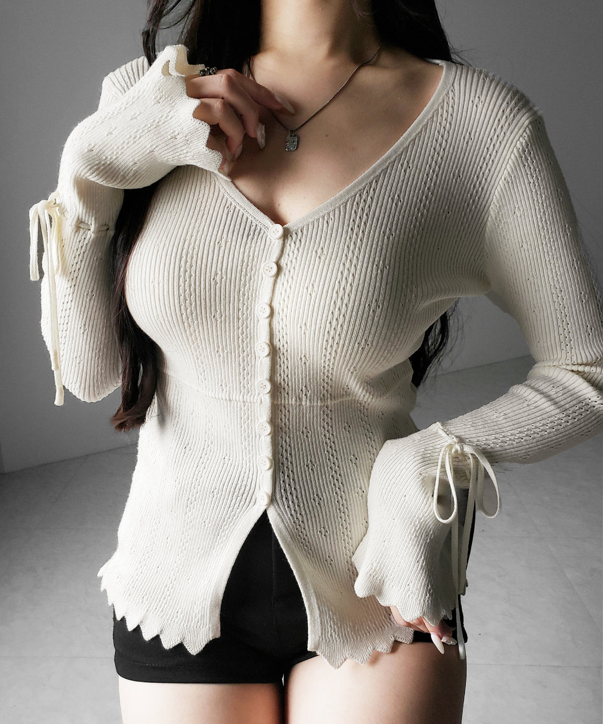 フレアリボンスリーブ透かし編みニットカーディガン / flare ribbon sleeve openwork knit cardigan
