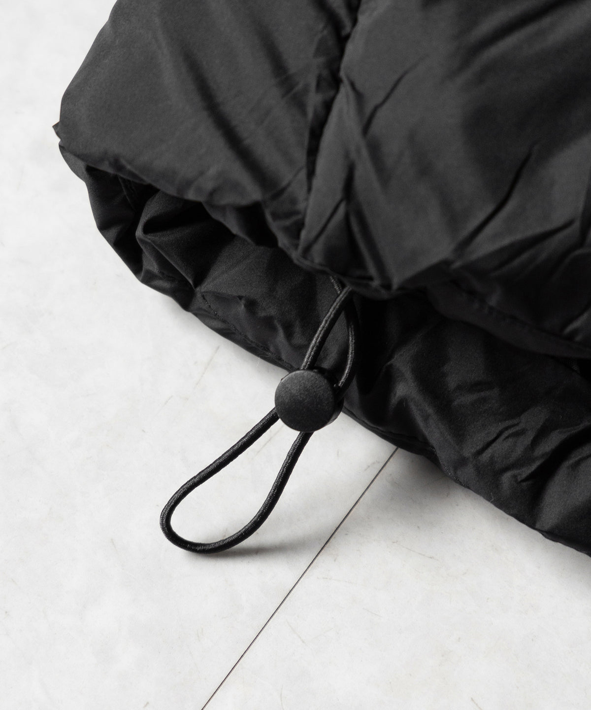 スタンドネックボリュームフーディ中綿パフジャケット / Stand-neck volume hooded fake down puff jacket