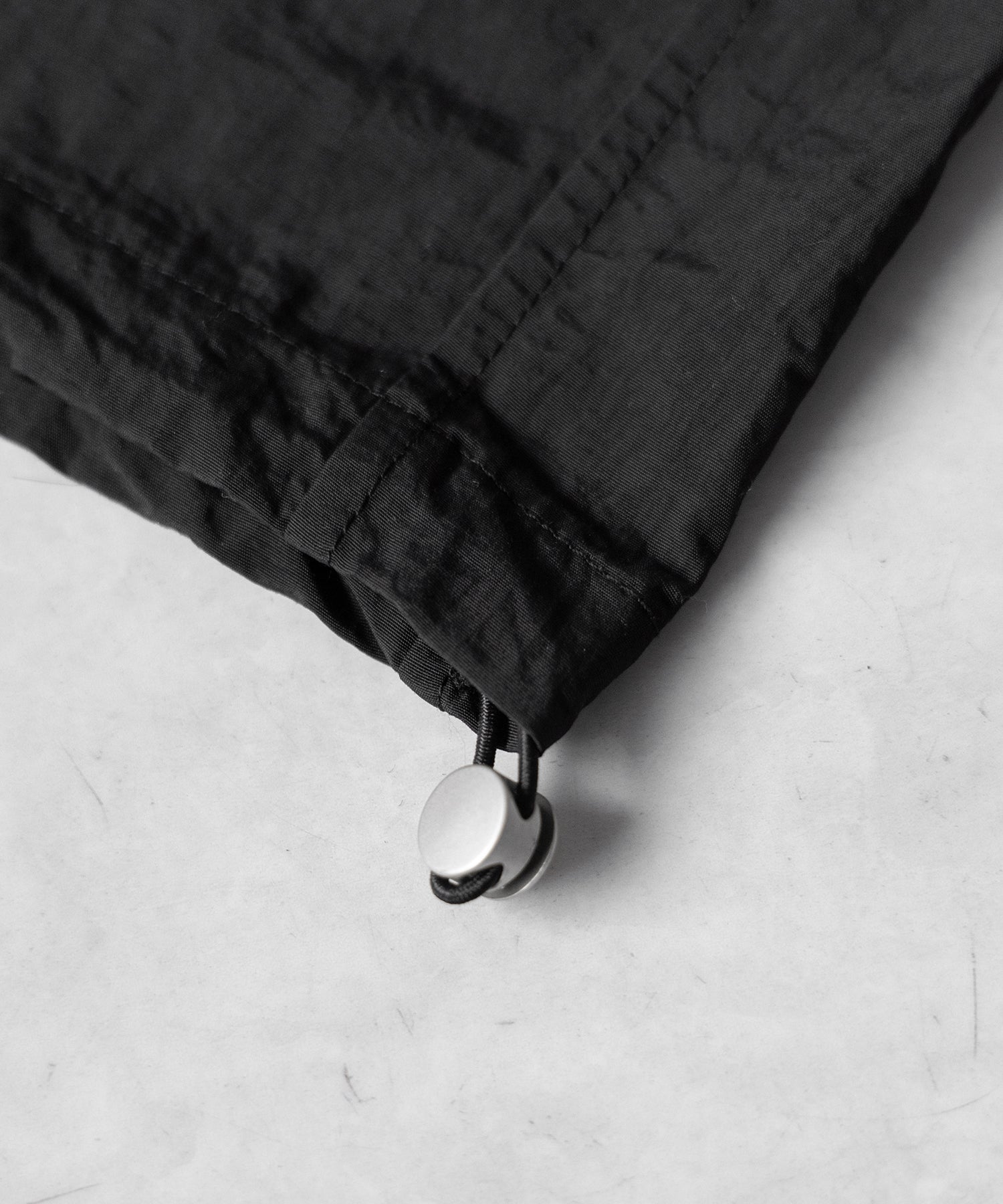 【 2color / 裾絞り可能 】ウエストロゴナイロンライクワッシャーワイドパンツ / waist logo nylon-like washer wide pants