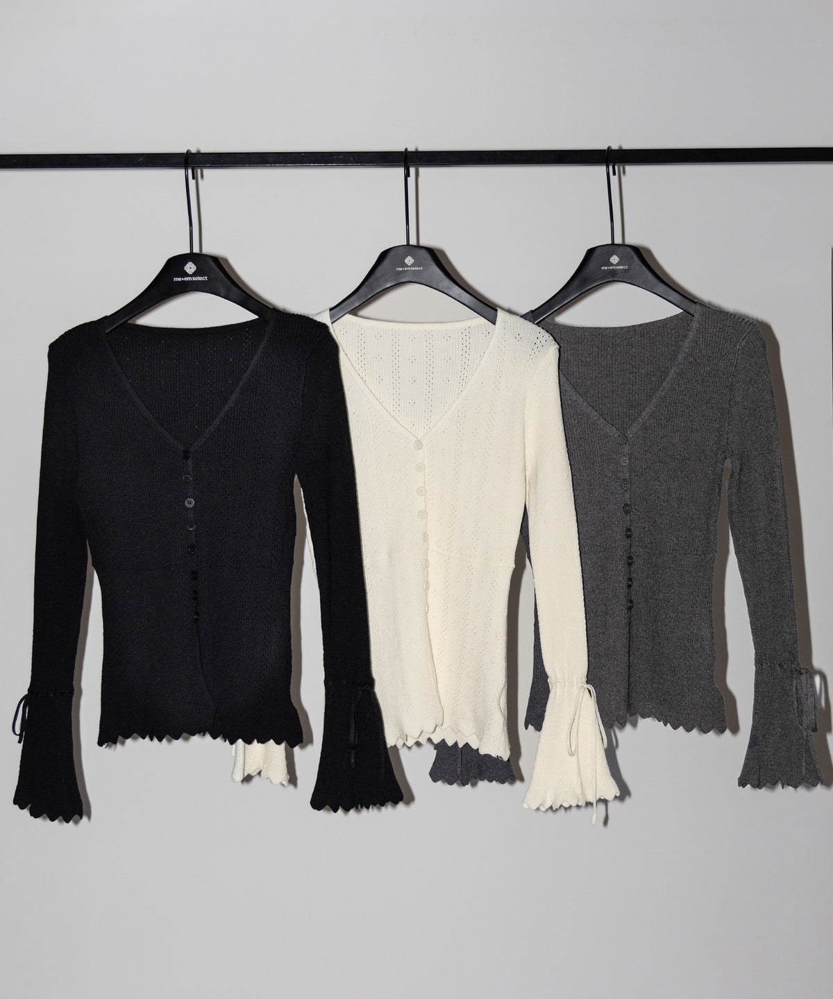 フレアリボンスリーブ透かし編みニットカーディガン / flare ribbon sleeve openwork knit cardigan