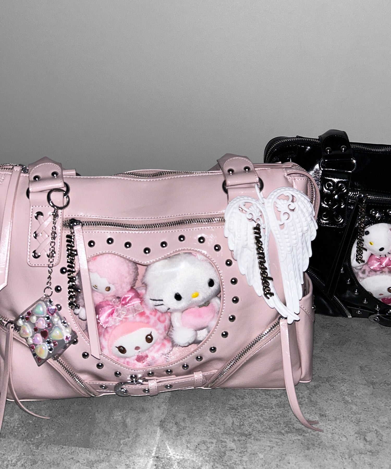 【 限定先行販売 】ハートクリアポケットスタッズフェイクレザートートバッグ ／ heart clear pocket studs fake leather tote bag
