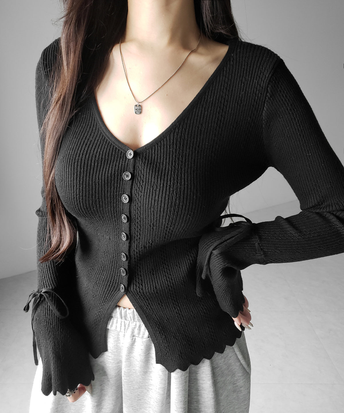 フレアリボンスリーブ透かし編みニットカーディガン ／ flare ribbon sleeve openwork knit cardigan