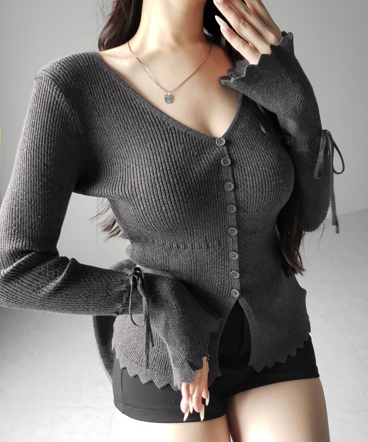 フレアリボンスリーブ透かし編みニットカーディガン ／ flare ribbon sleeve openwork knit cardigan